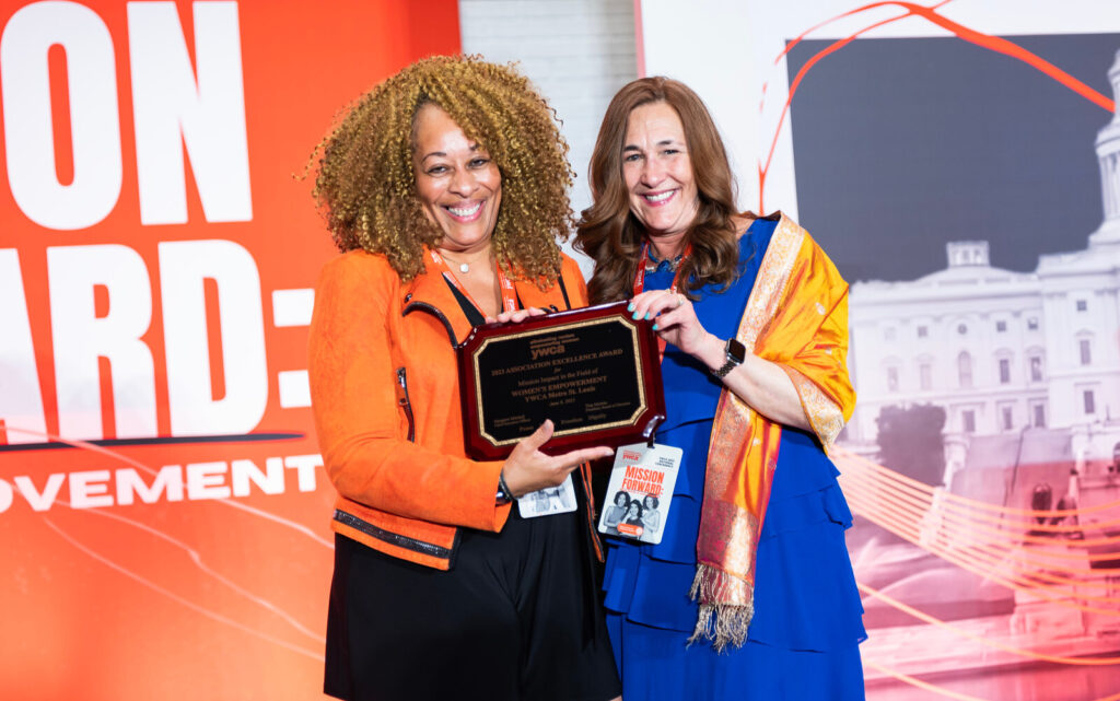 Cheryl accepting award at YWCA National Conference