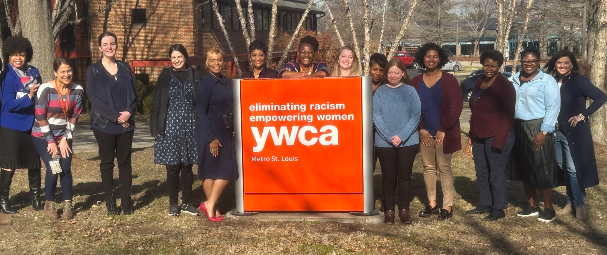 YWCA Staff wearing teal for April